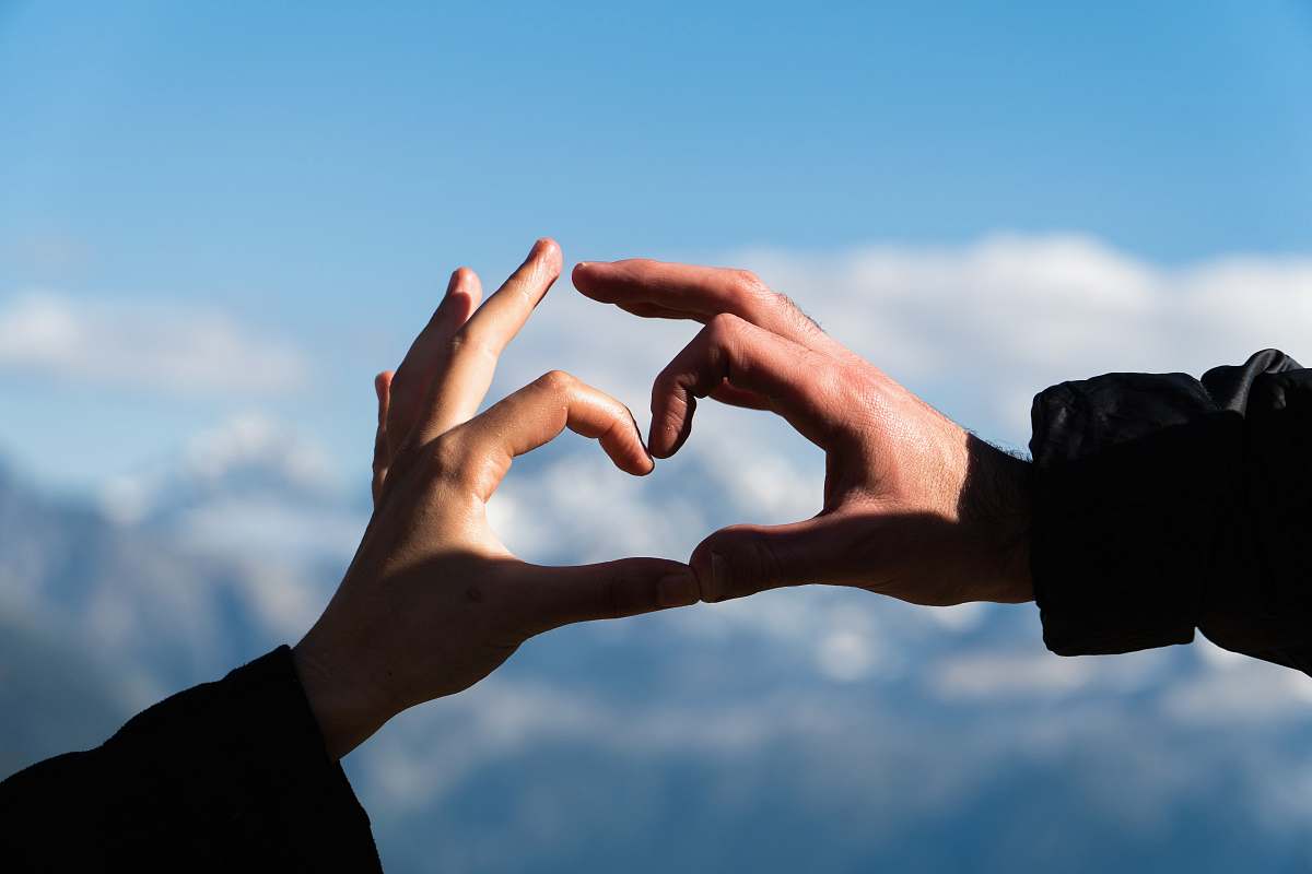 person human hand heart sign human
