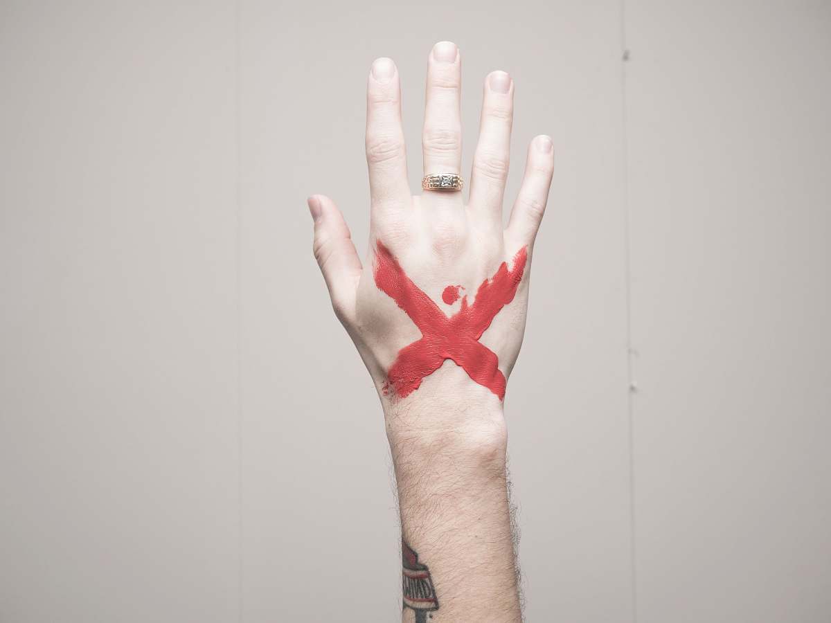 ring left human hand with x mark wrist