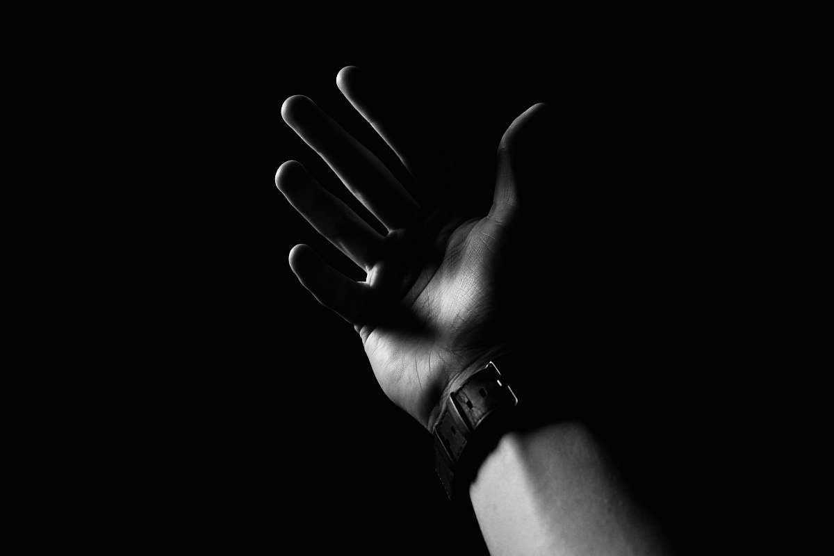 wristwatch left human palm black-and-white