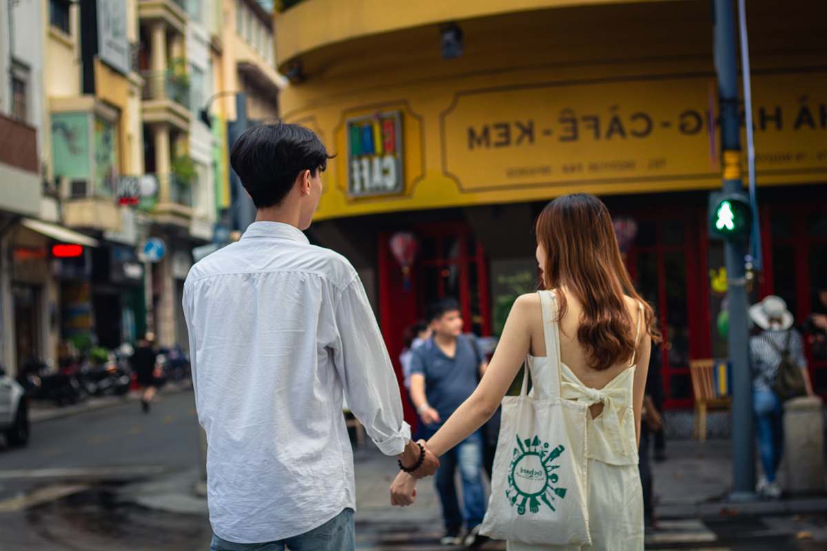 person man and woman standing on street human