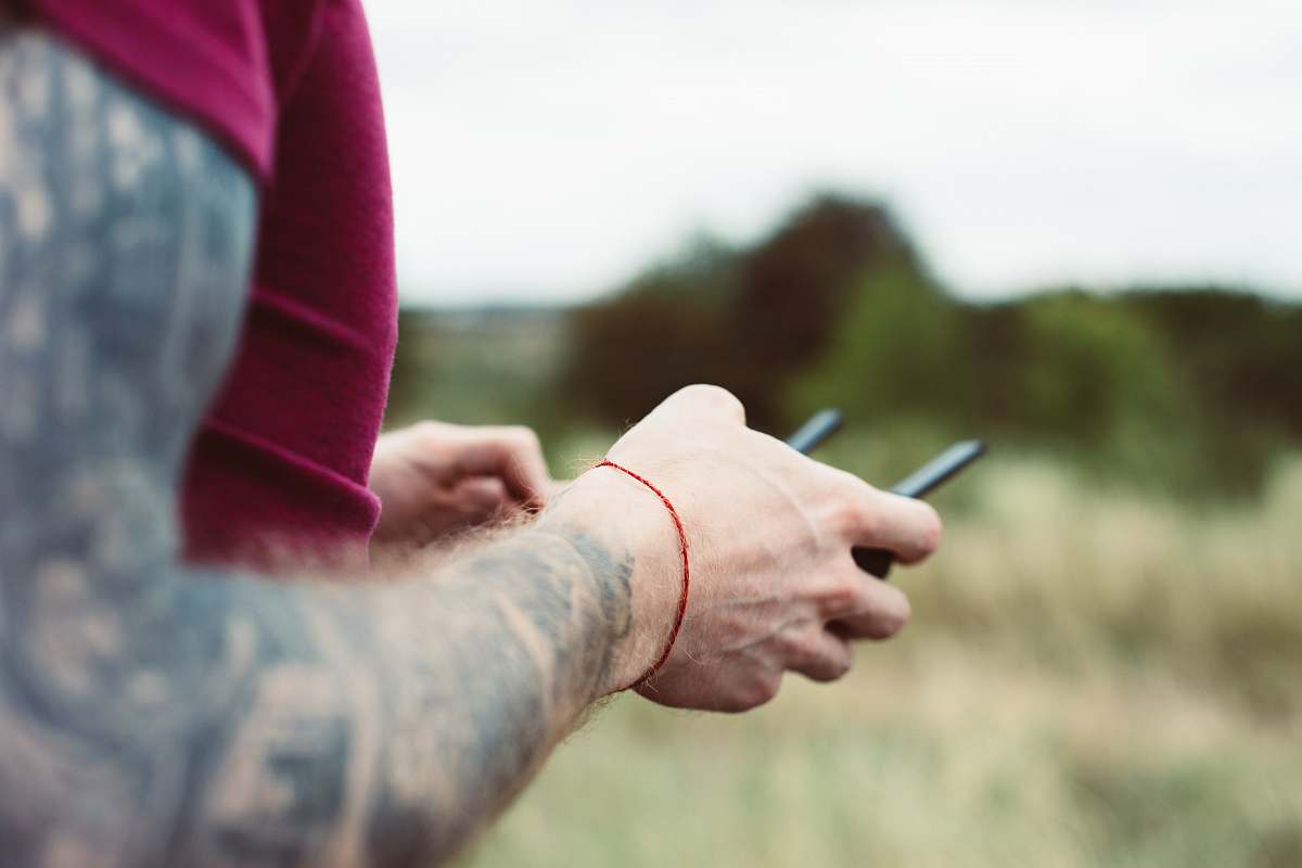 arm man holding drone remote skin