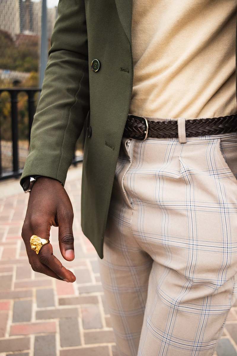 human man wearing green blazer person