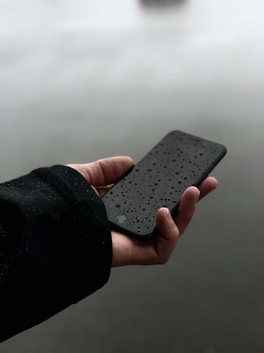 iphone person holding iPhone phone