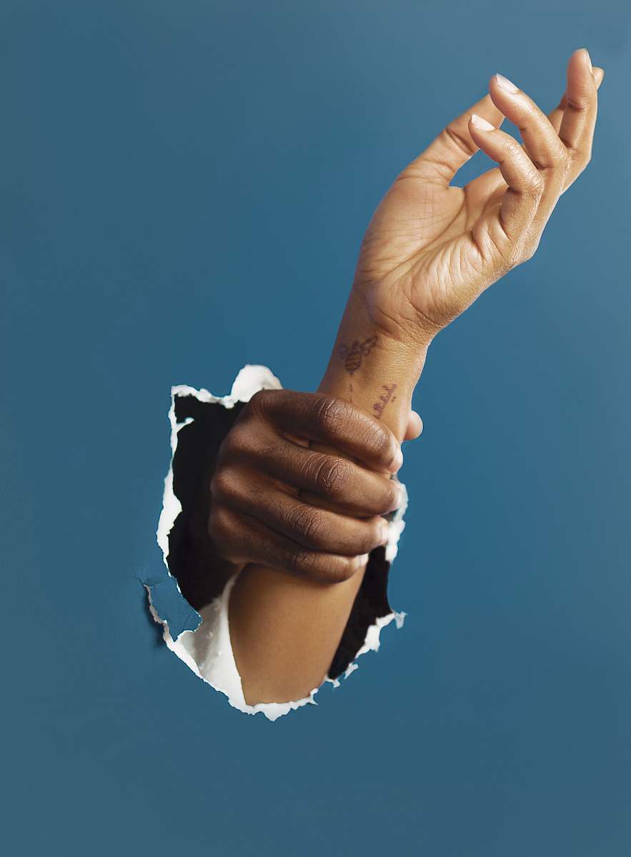 finger person holding right hand of another person person