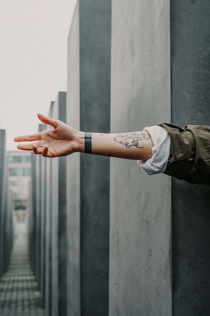 skin person showing arm tattoo arm