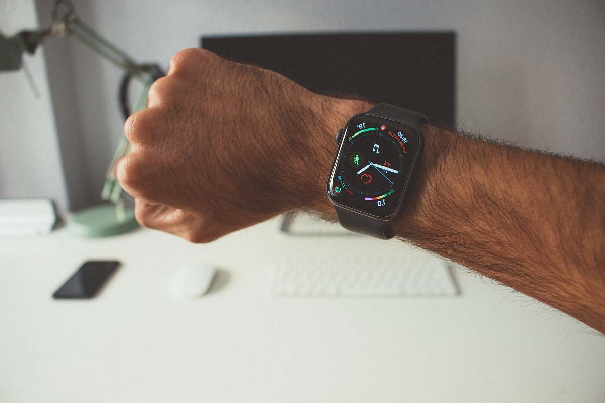 wristwatch person wearing Apple Watch digital watch
