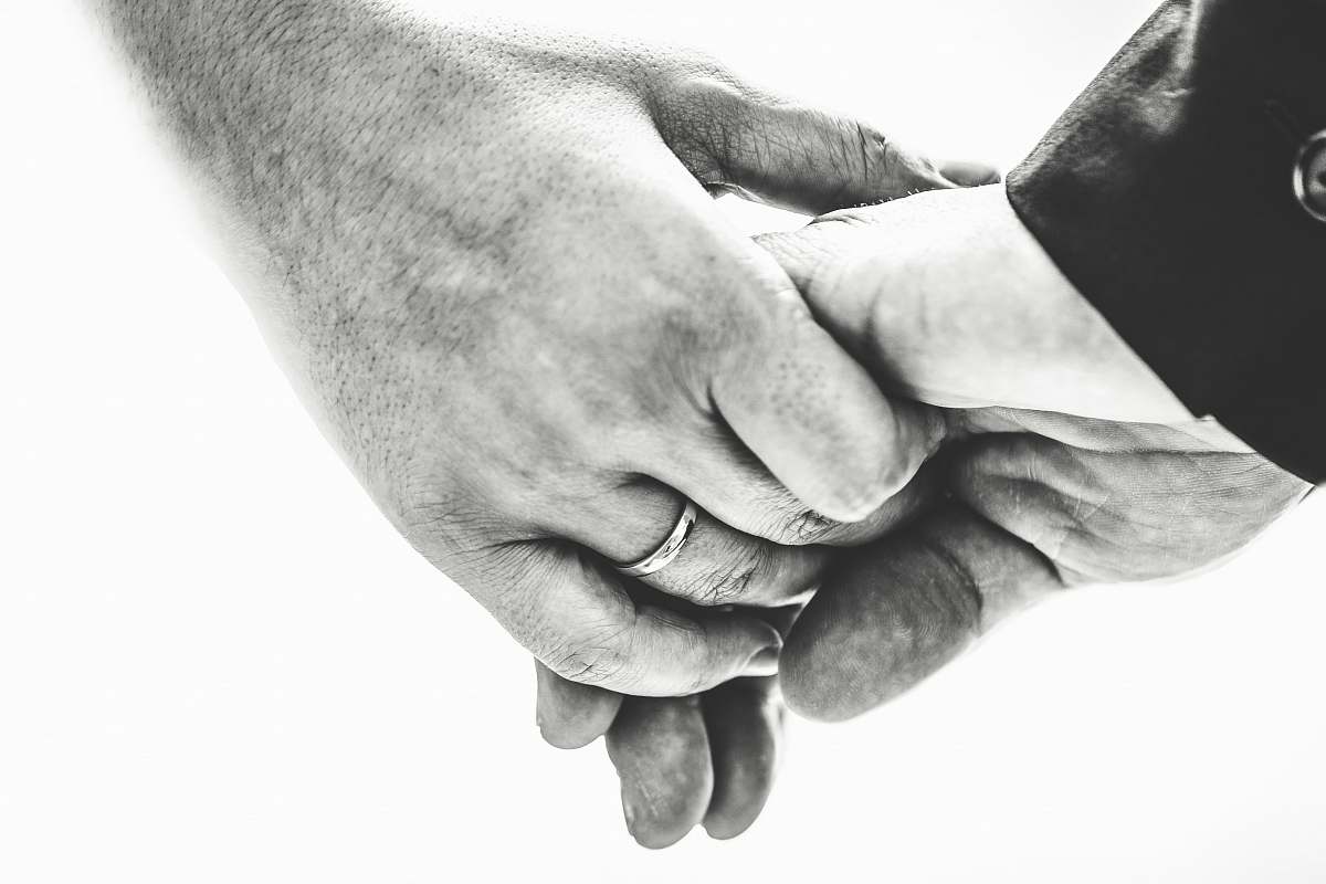 black-and-white person's hand grey