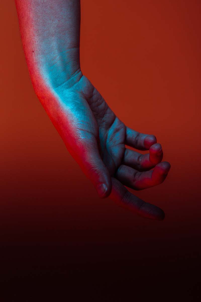hands person's left hand red
