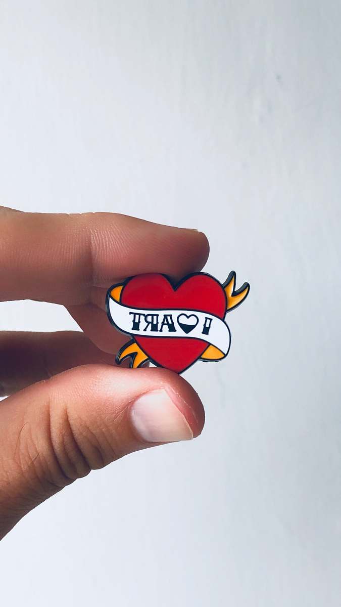 human red heart pin person