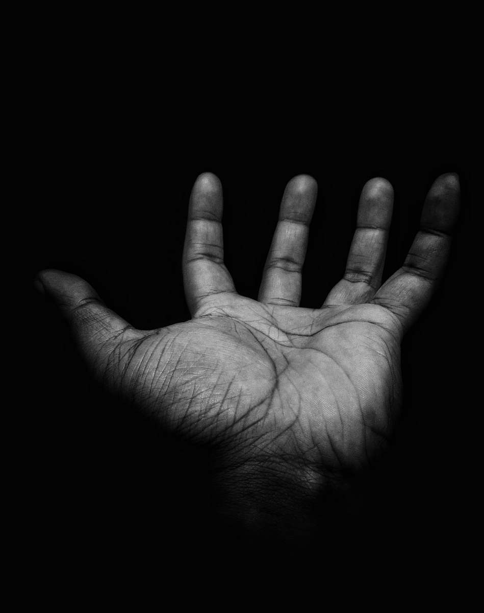 black-and-white right person's palm grey