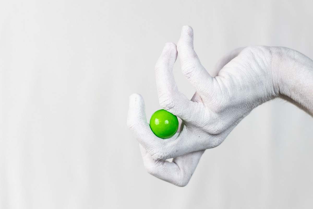 human selective focus photo of green fruit person
