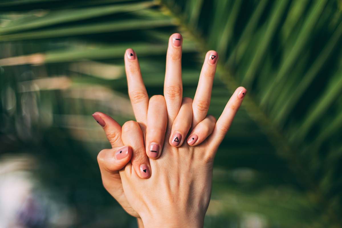 nail selective focus photography of person's hands las palmas de gran canaria