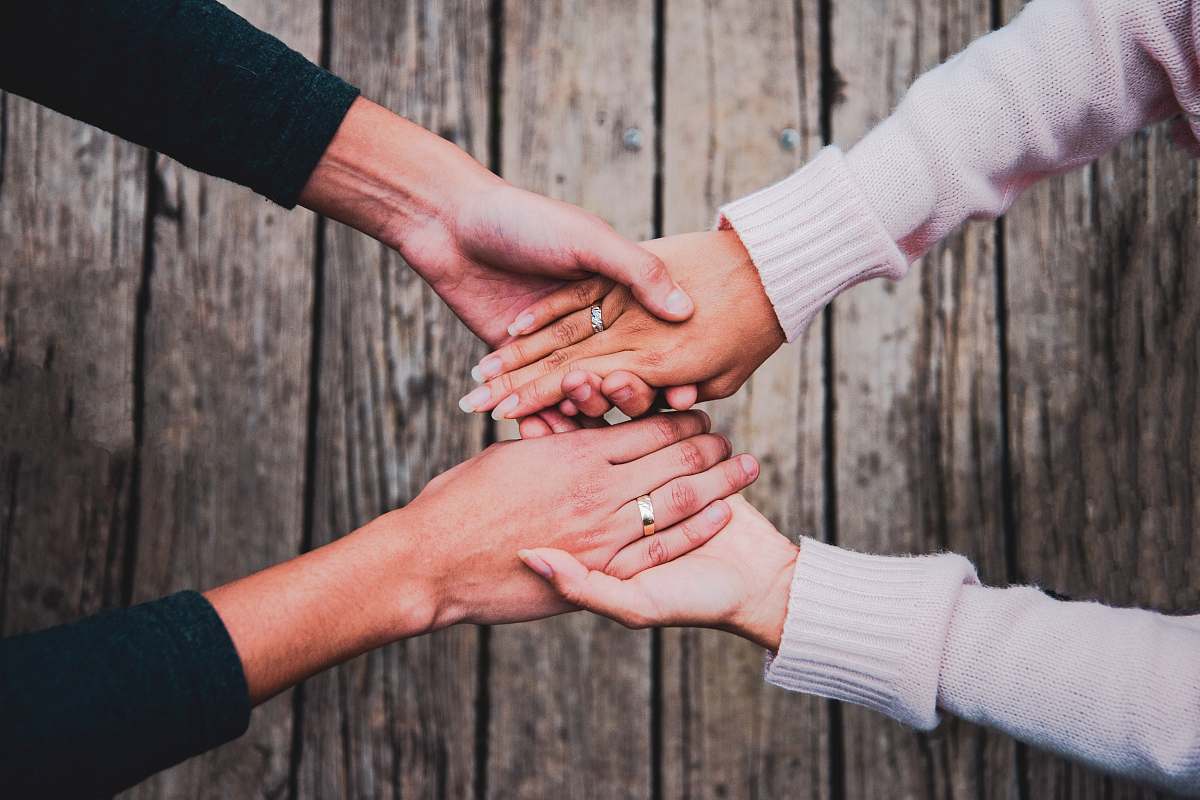 human two people holding their hands person