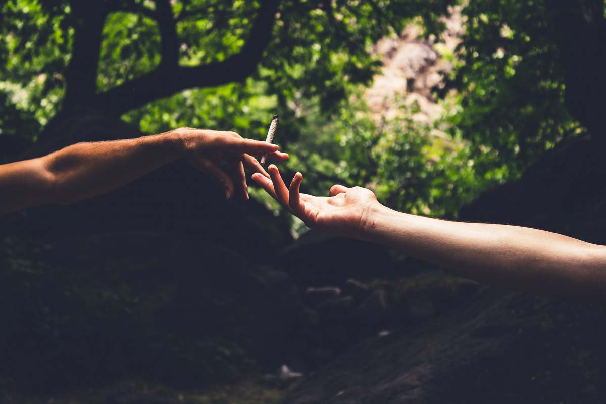 imlil two person reaching each others hand morocco
