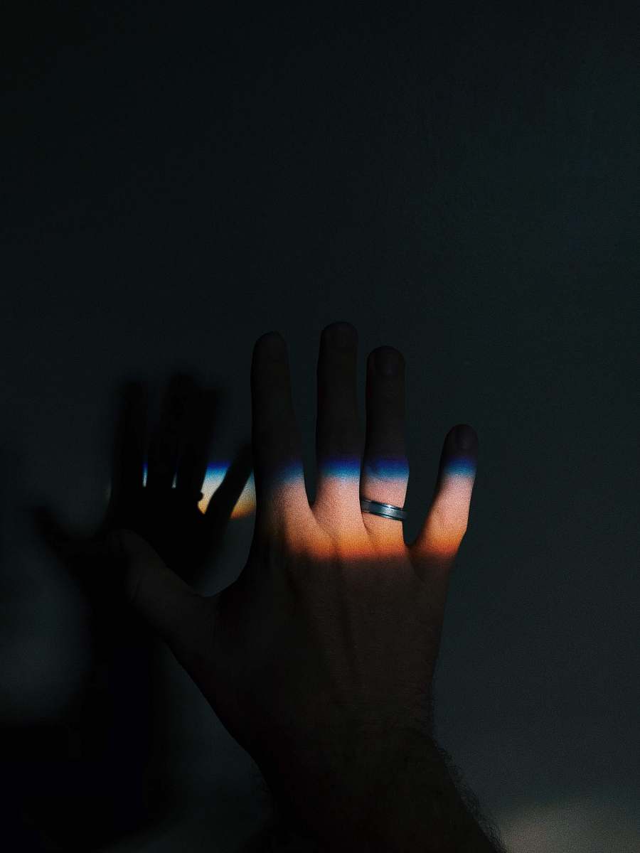 human two persons showing silver-colored rings on light finger