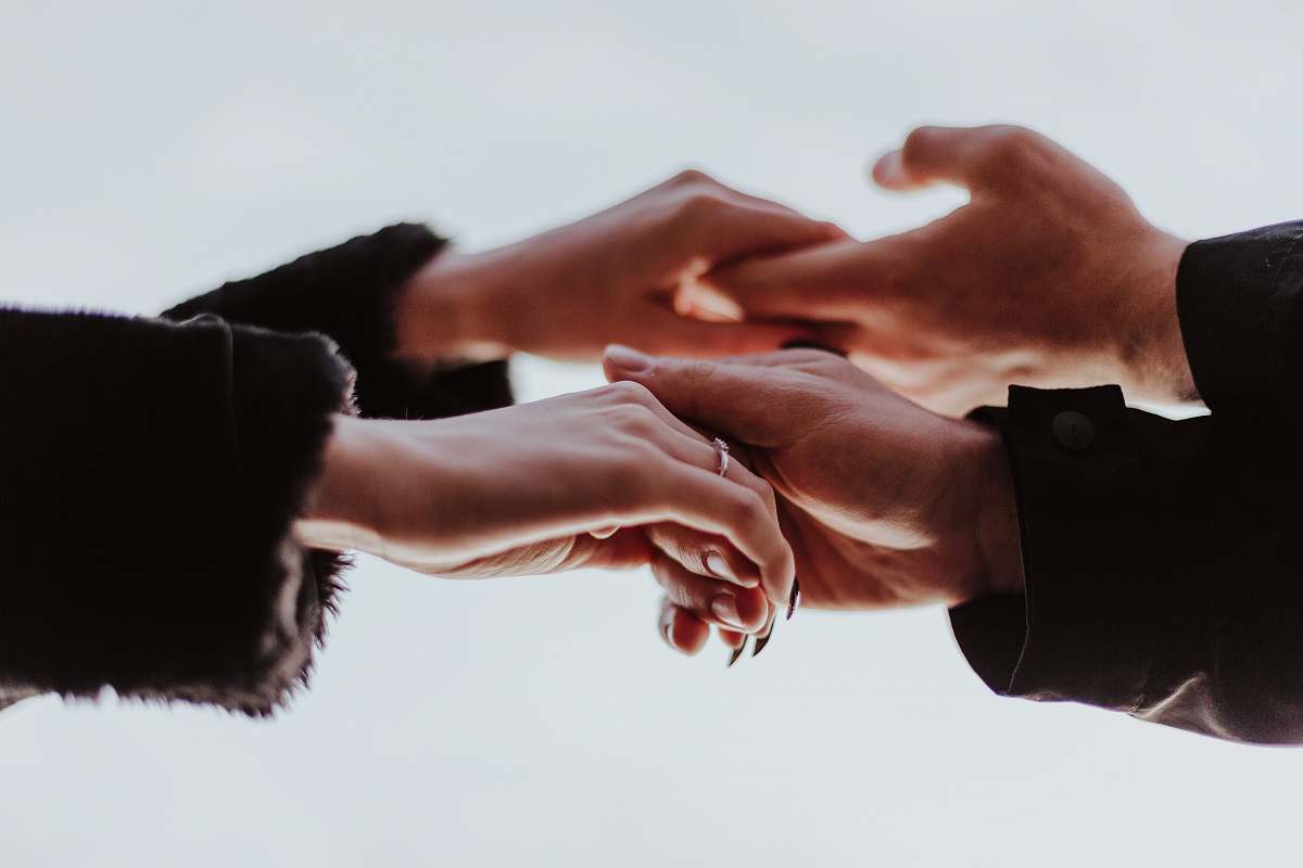 human view photography of person hands while holding person