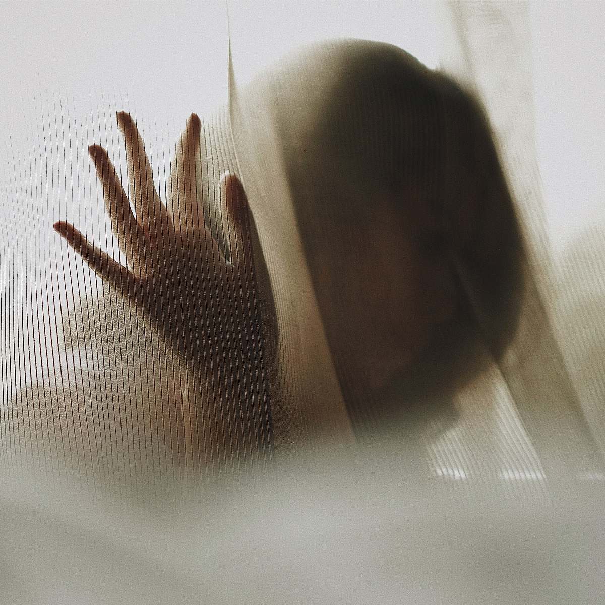 woman woman touching white textile texture