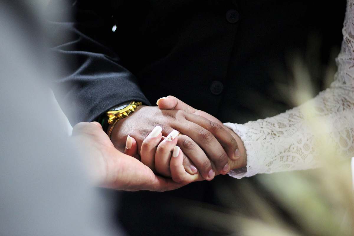hand man and woman holding hands wedding