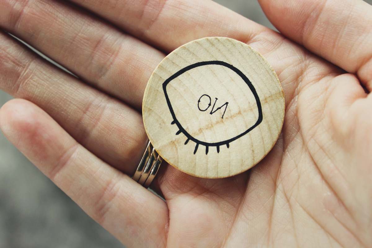 person brown wood ornament with no sign hand