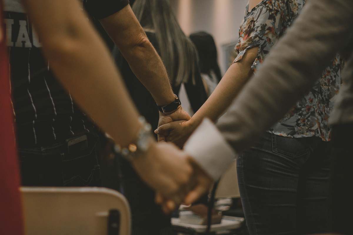 person couples holding hands hand