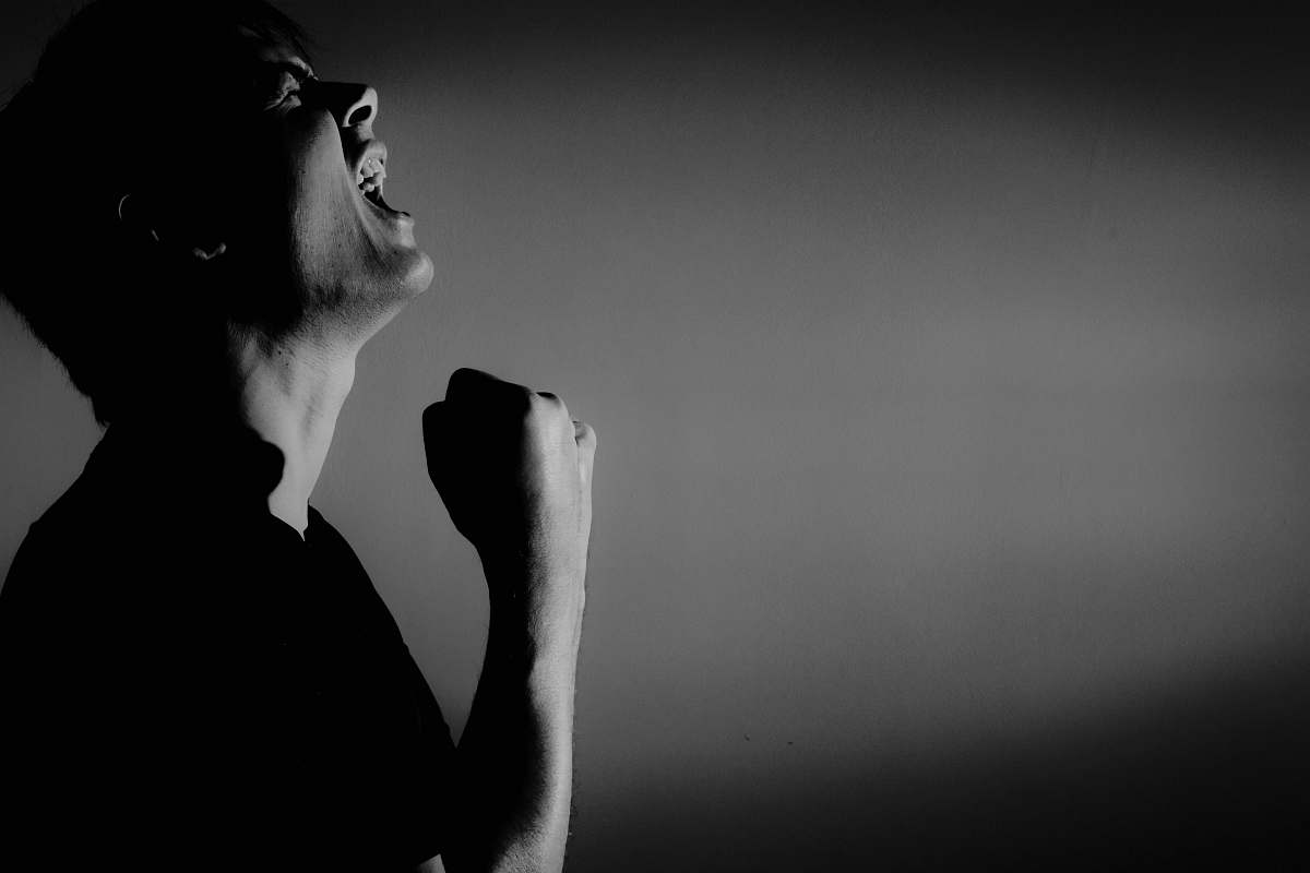 person grayscale photography of man black-and-white