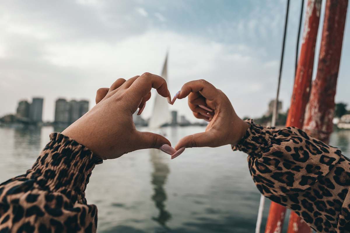 person human hands making heart shape egypt