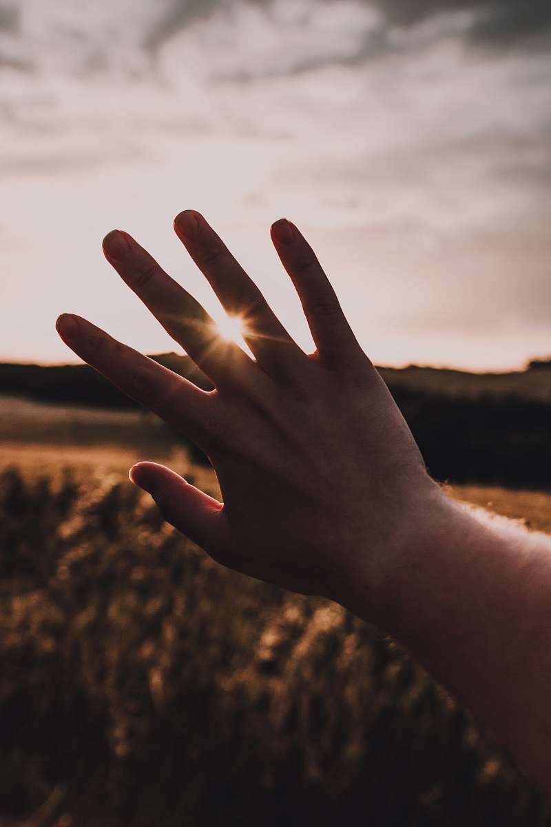 person left person hand finger