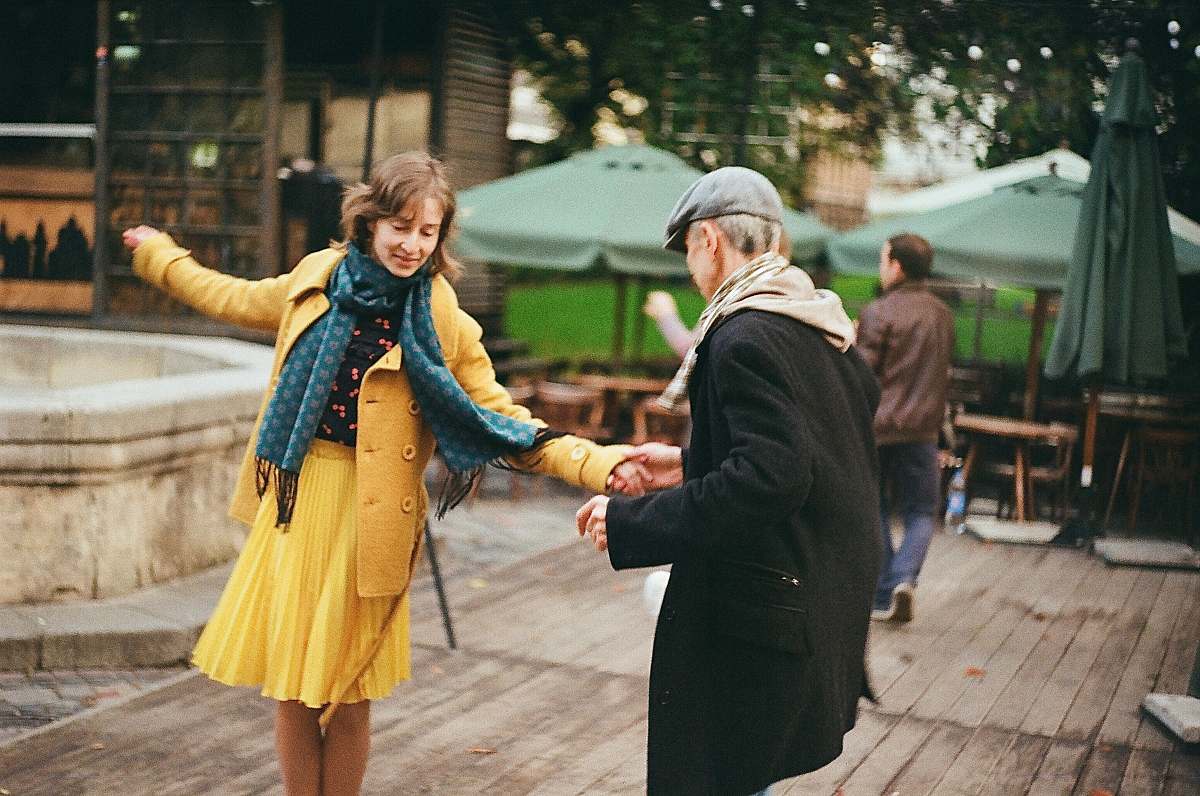 person man and woman dancing apparel