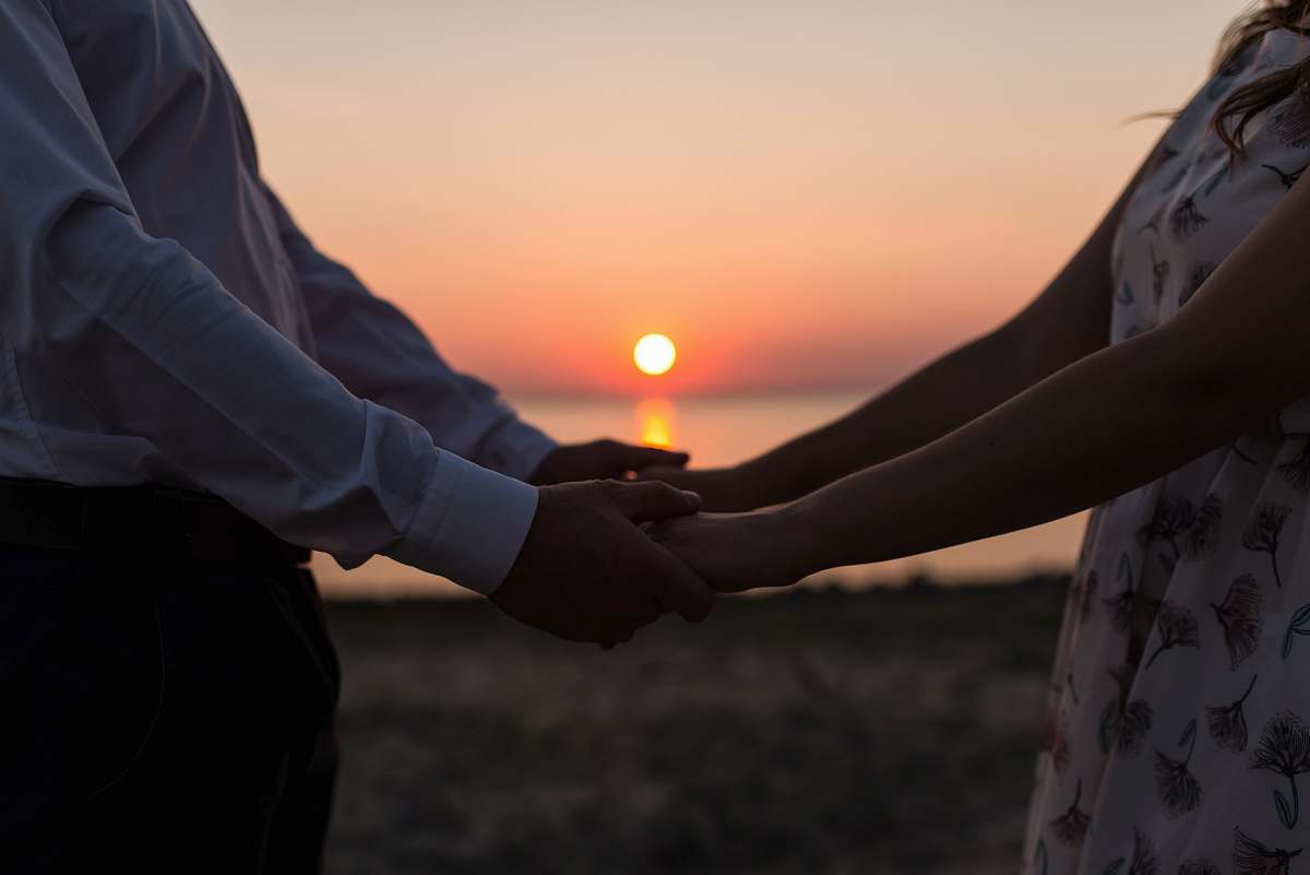 hand man and woman holding each others' hands holding hands