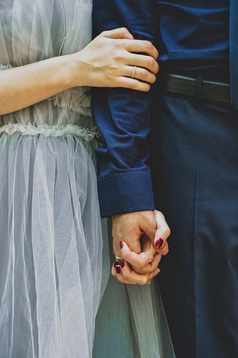 hand man and woman holding hands holding hands