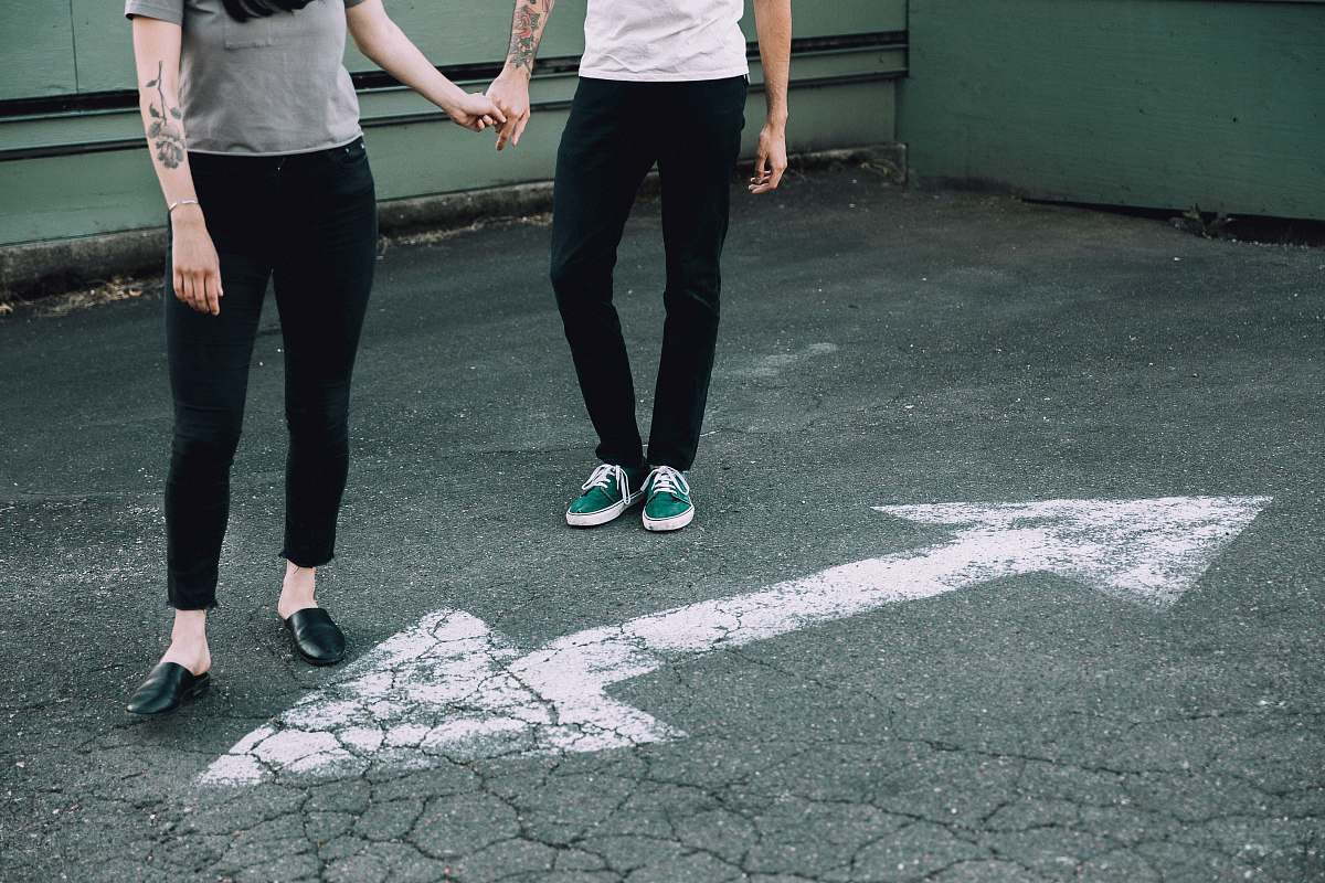 people man and woman holding hands holding hands