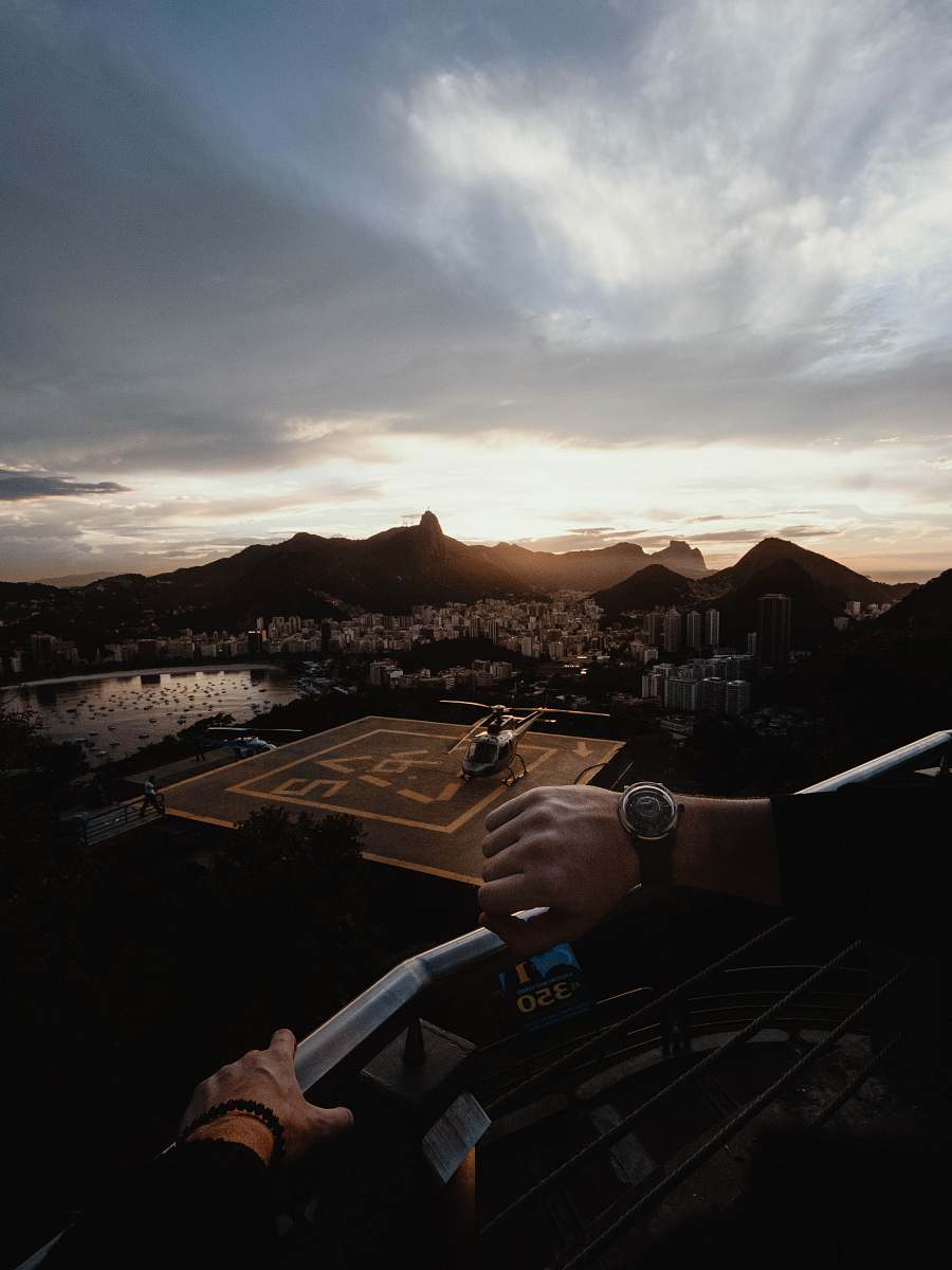 person man looking at watch time