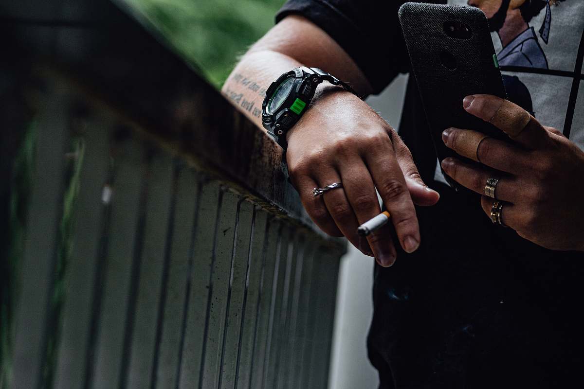 wristwatch man smoking photography phone