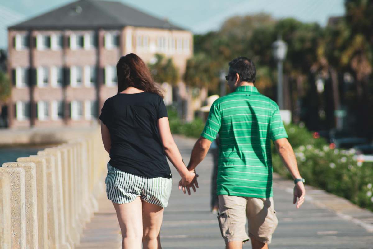 person man wearing green stripe polo shirt apparel