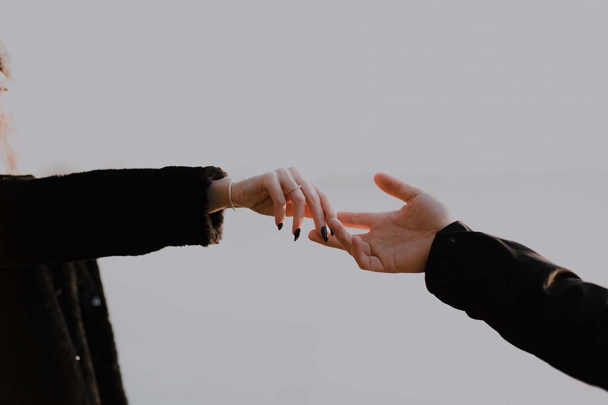 person people hands reaching out hand