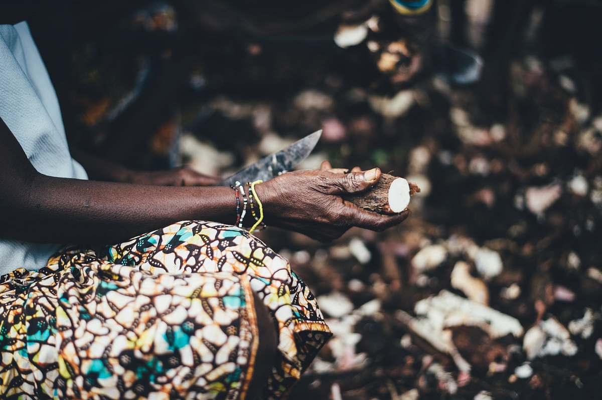 person person carving wood using knife sierra leone