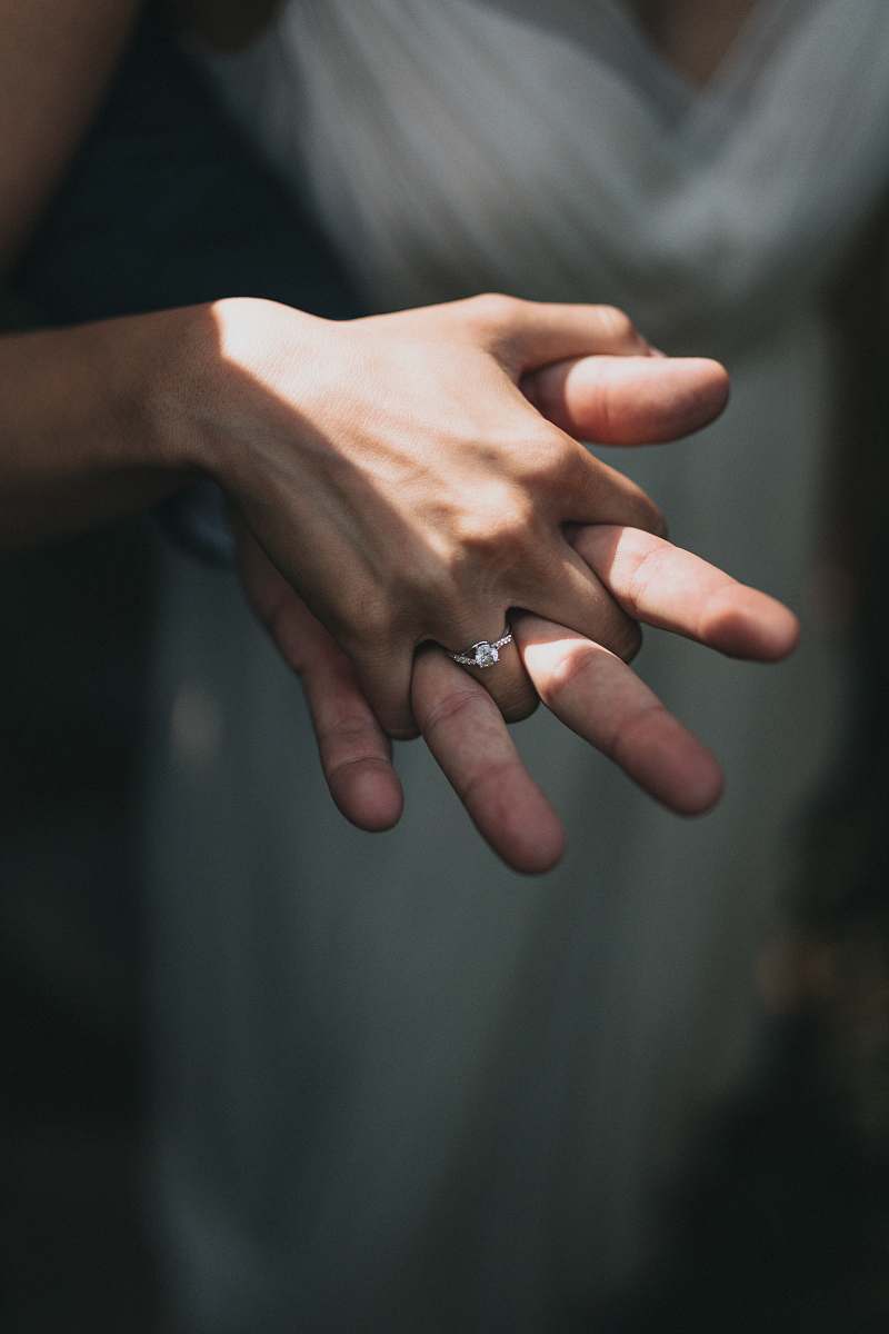 person person putting hands together hand