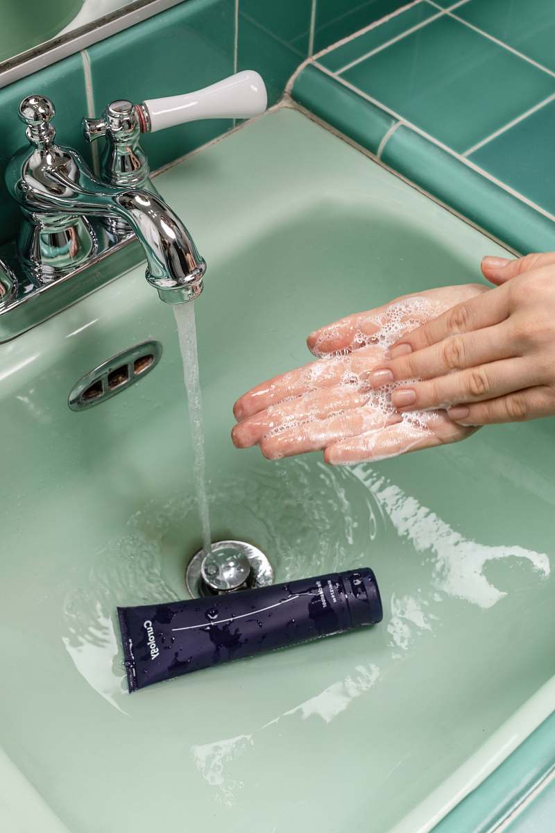 person person washing hands on sink skin
