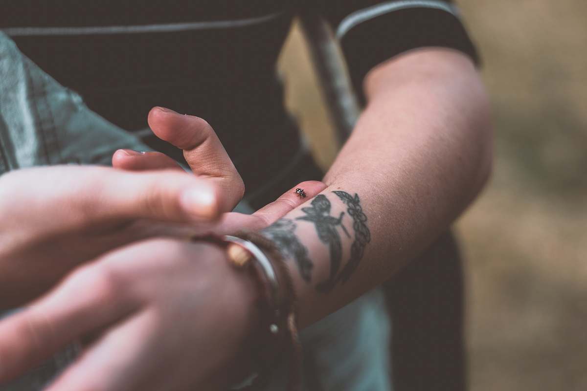 person person with arm tattoos skin