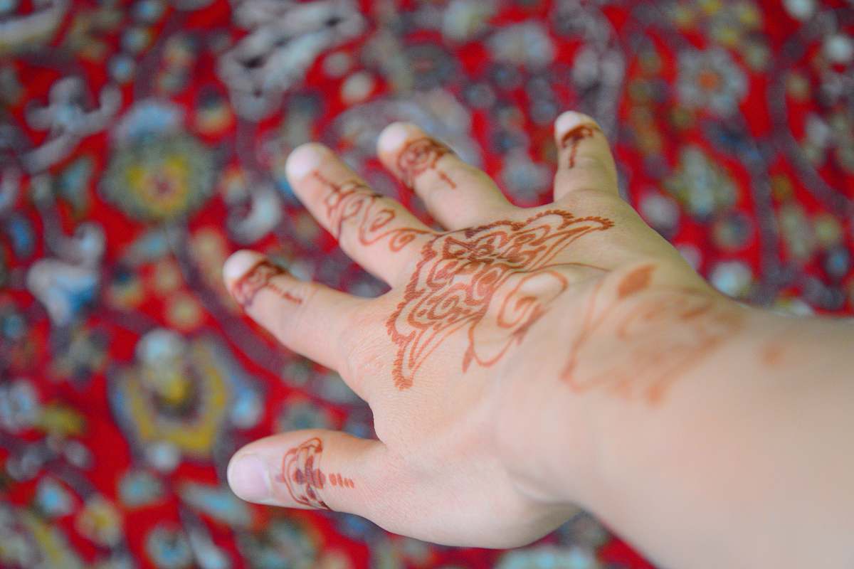 person person with mehndi tattoo henna