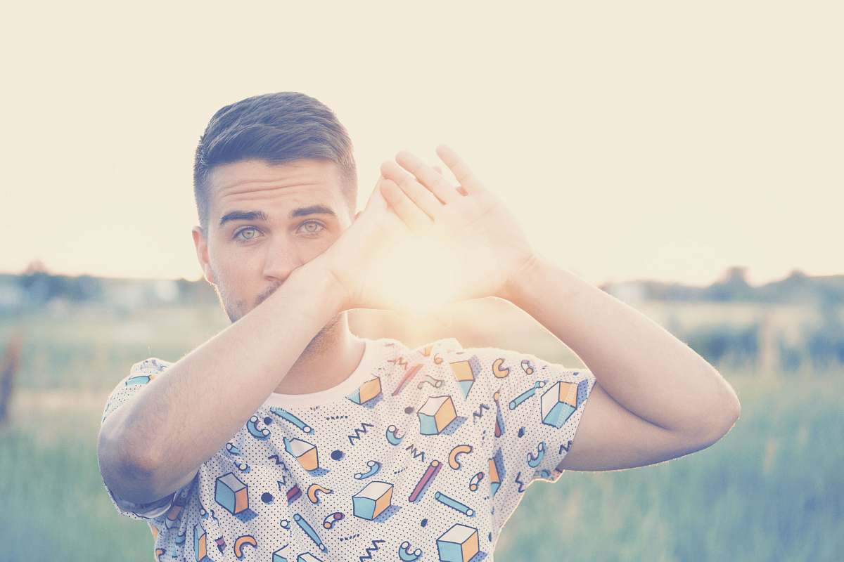 person photo of man wearing white and blue crew-neck shirt face