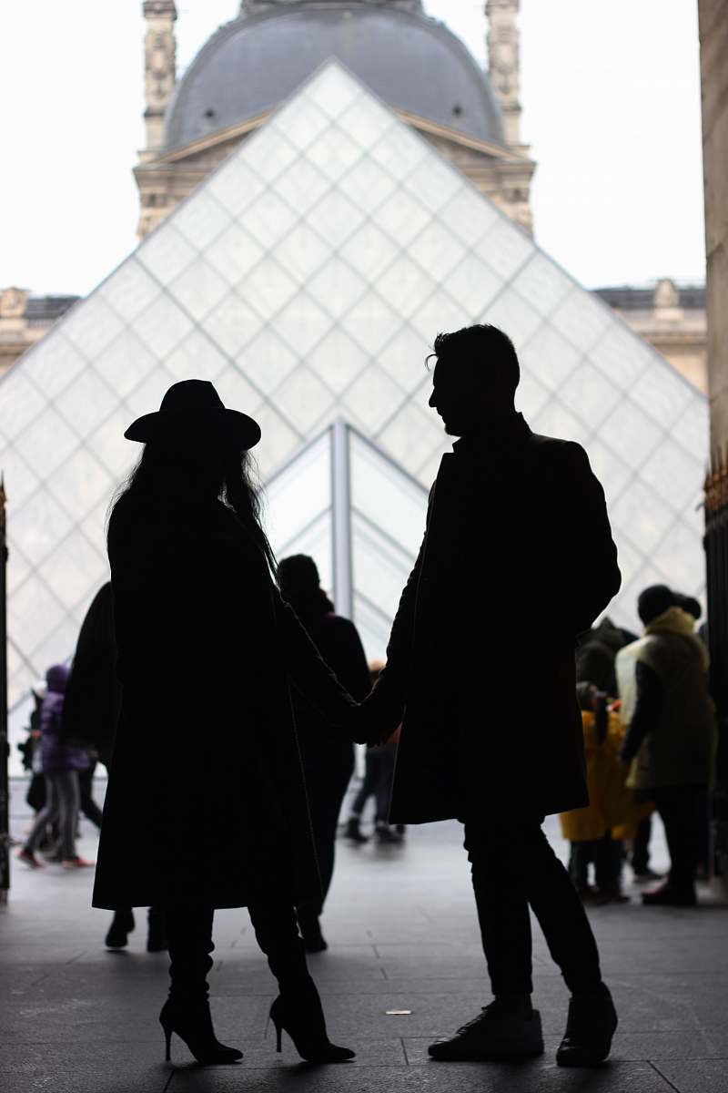 pedestrian silhouette photography of couple person