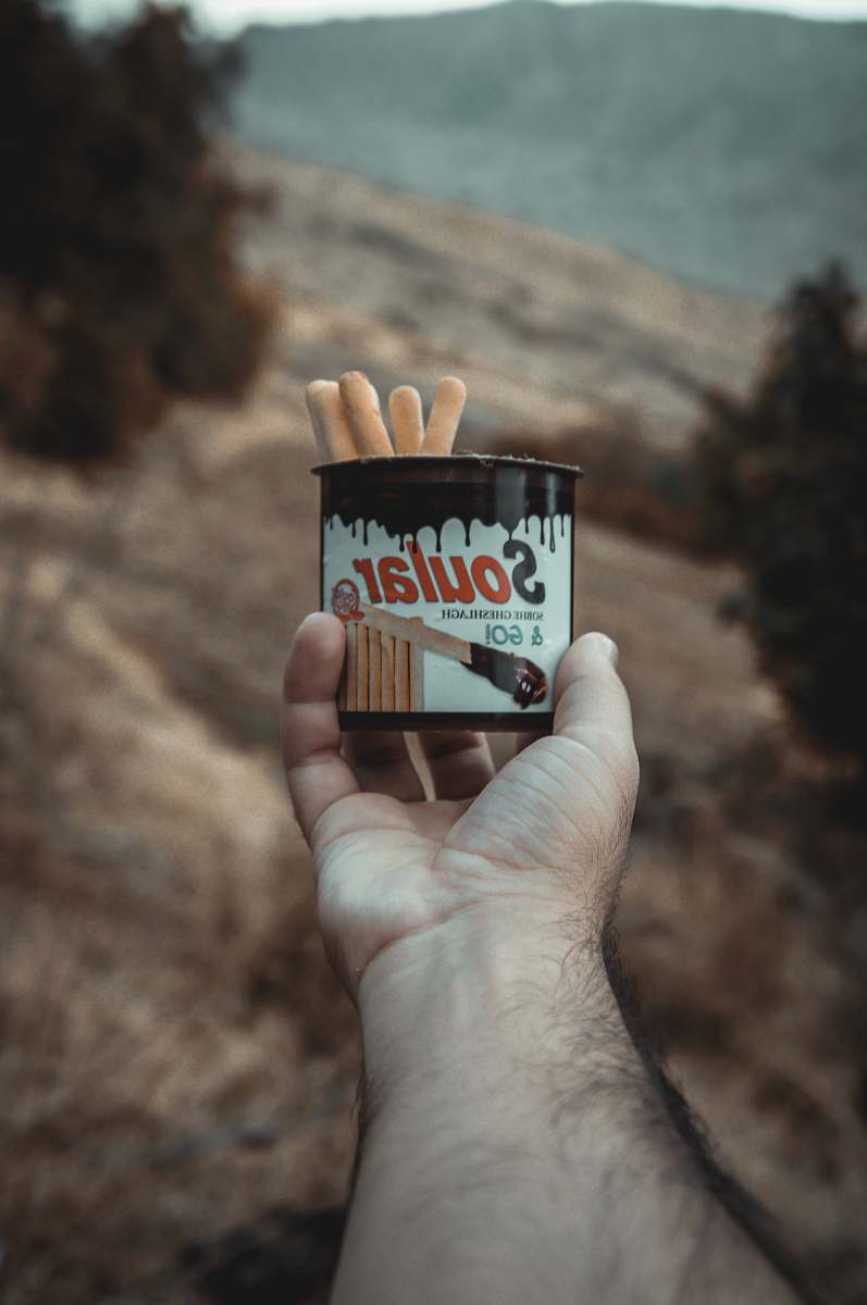 finger Soular breadsticks in can hand