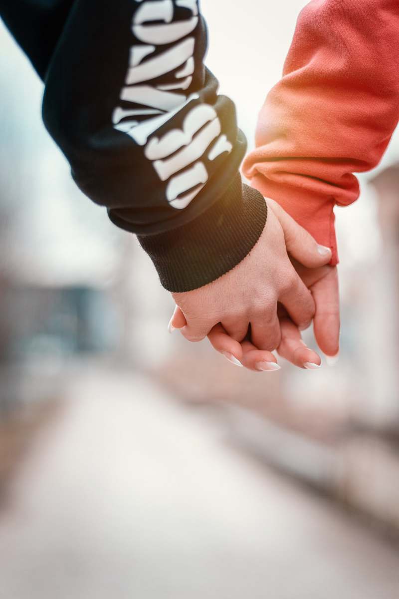 hand two person holding hands in selective focus photography holding hands