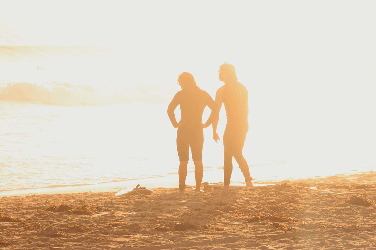 person two persons on seashore hand