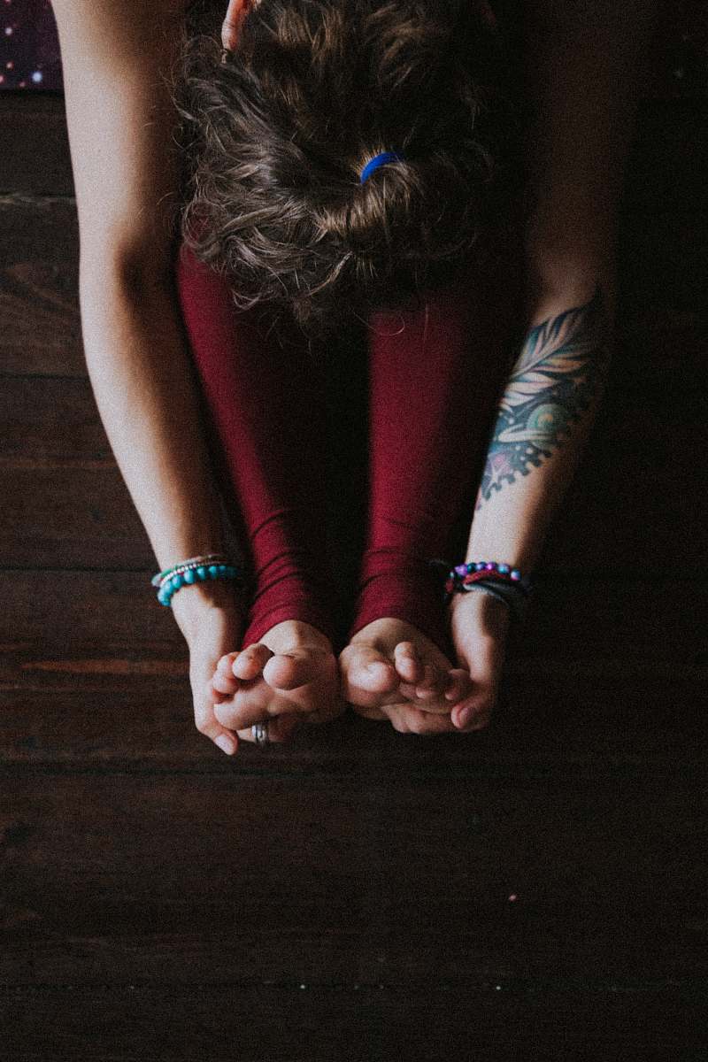 skin unknown person stretching indoors tattoo