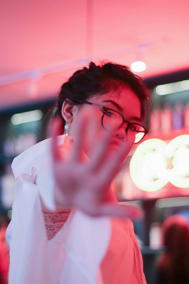person woman reaching camera people
