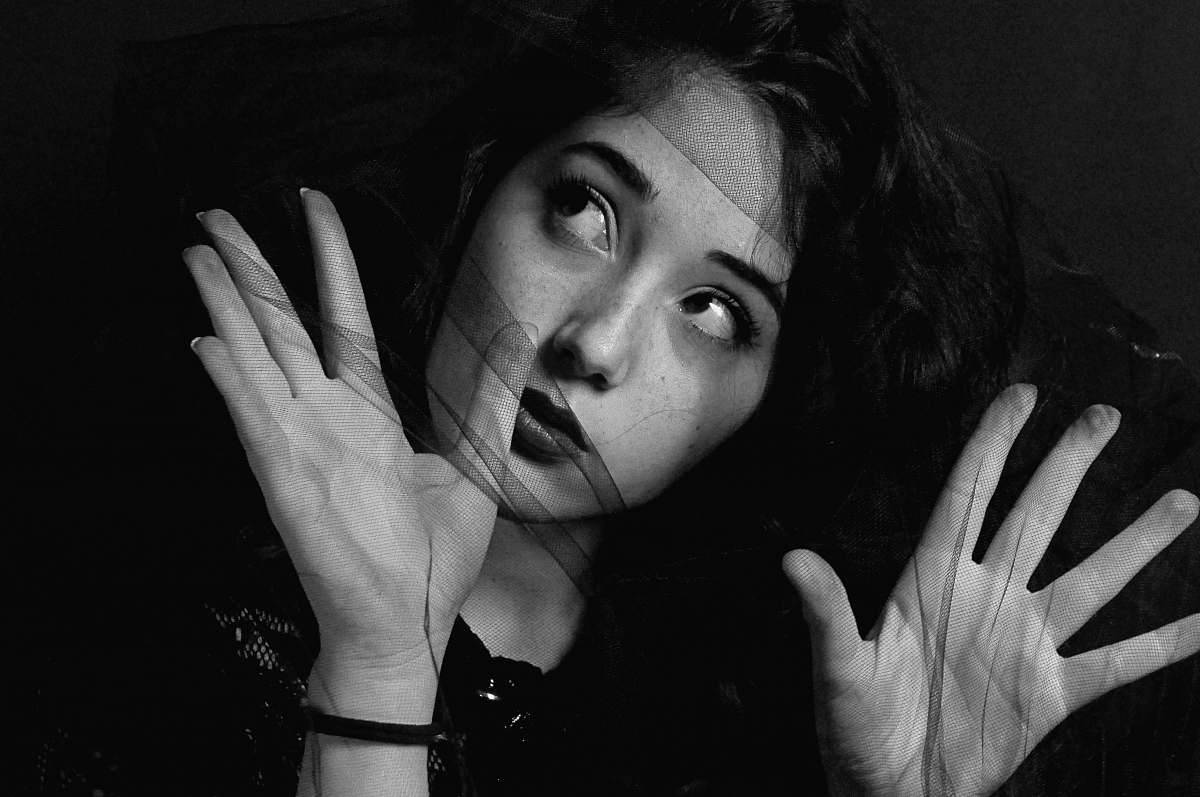 finger woman wearing sheer textile black-and-white