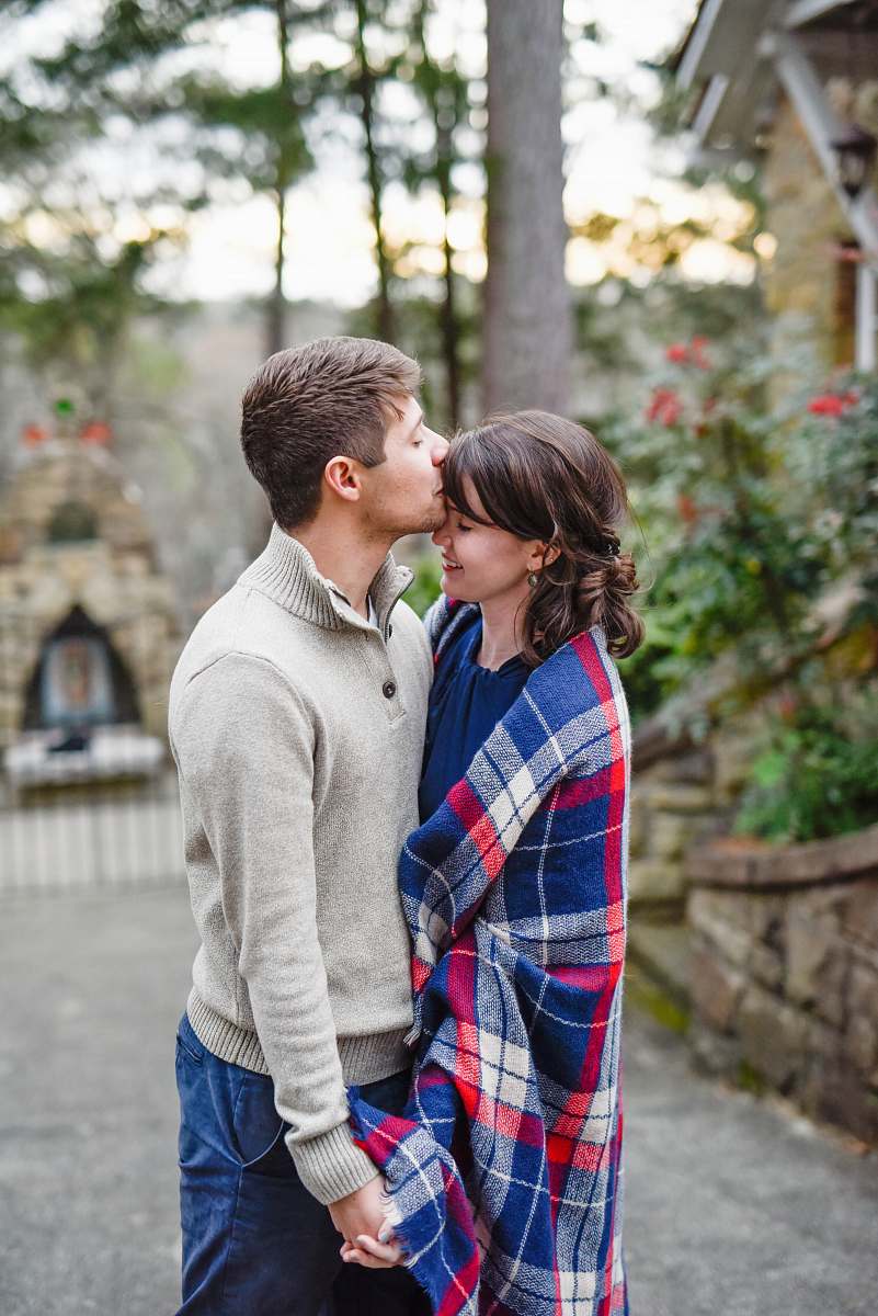 flora man kissing on woman forehead standing near tree during daytime pottery