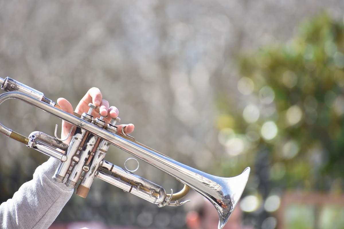 trumpet person playing trumpet outdoor brass